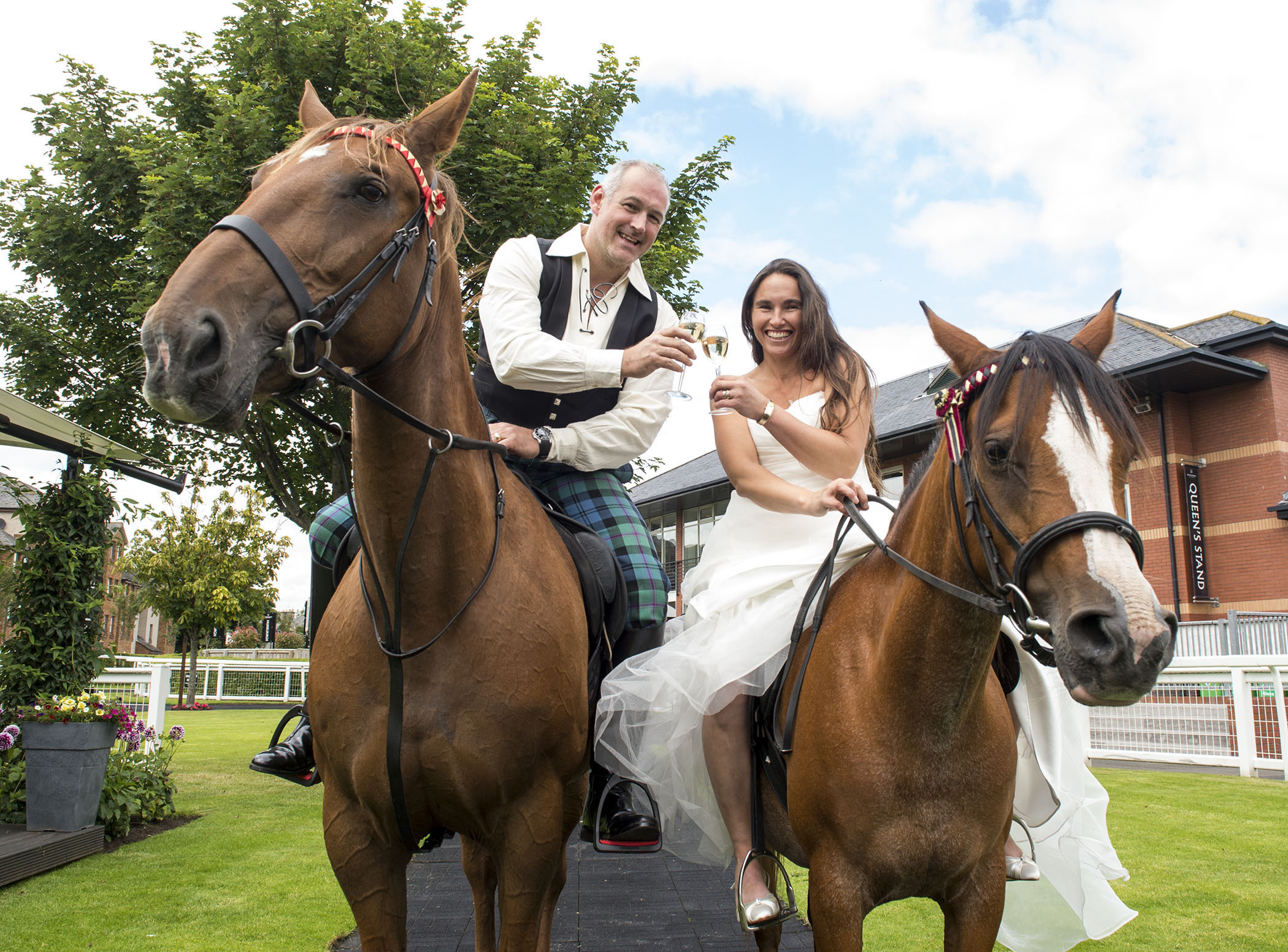 Major Chris Baird-Clark and bride Shelley got married life off to a winning start with a gallop at Musselburgh Racecourse.