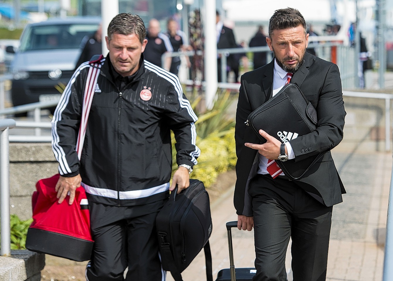 Derek McInnes (right) and assistant manager Tony Docherty at Aberdeen airport