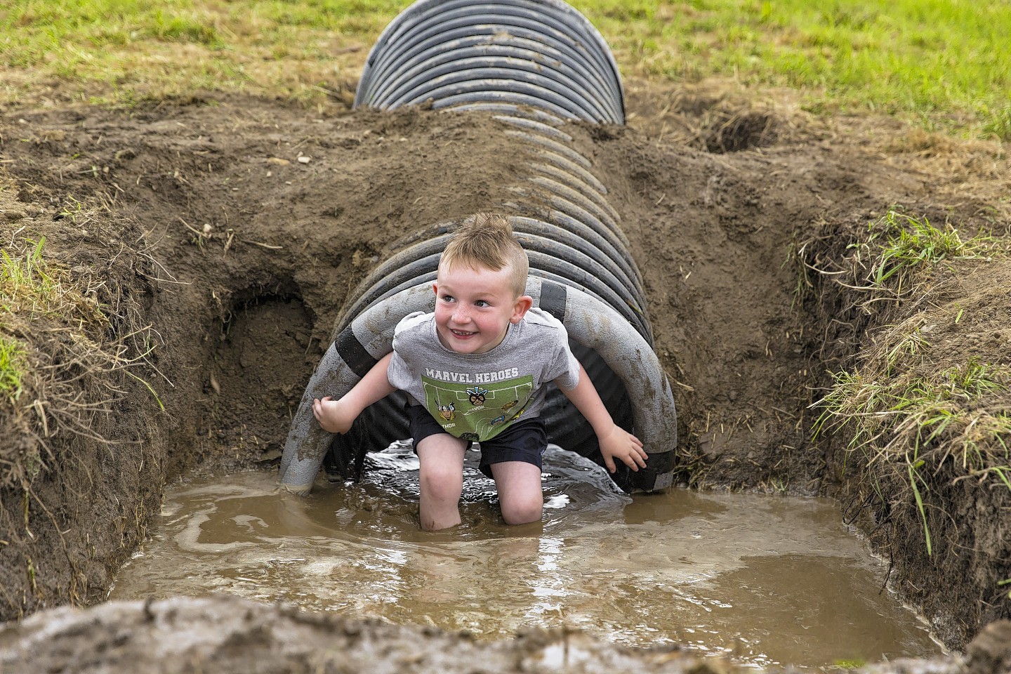 Liam Simpson, six, enjoying the water chute