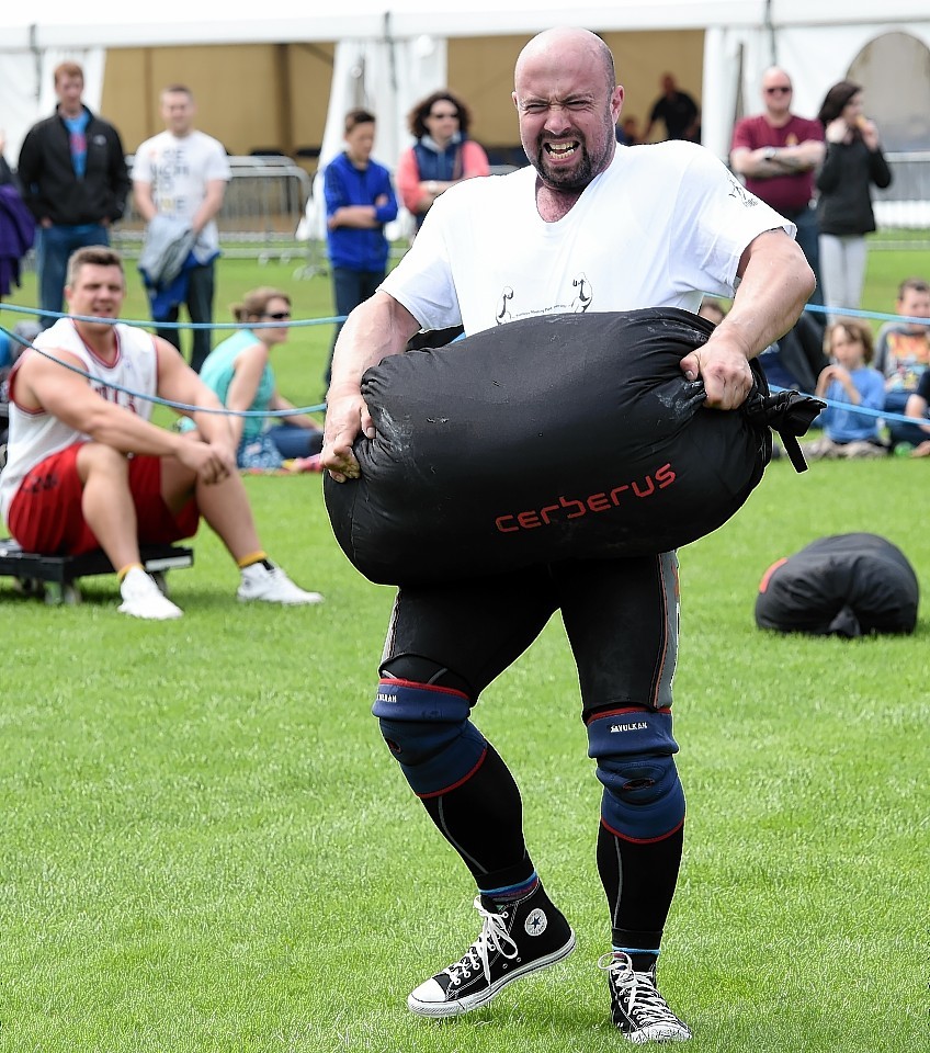 The Highland Strongman competition was held yesterday (Sun) in the Northern Meeting Park, Inverness. Lary Wood in action with the 120Kg sandbags.