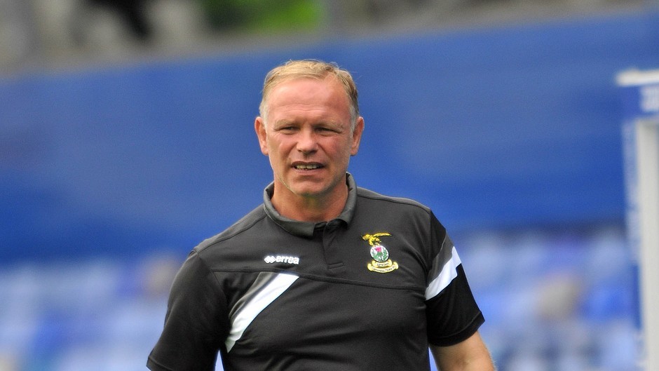 John Hughes had a brief spell in charge at Livingston in 2012.