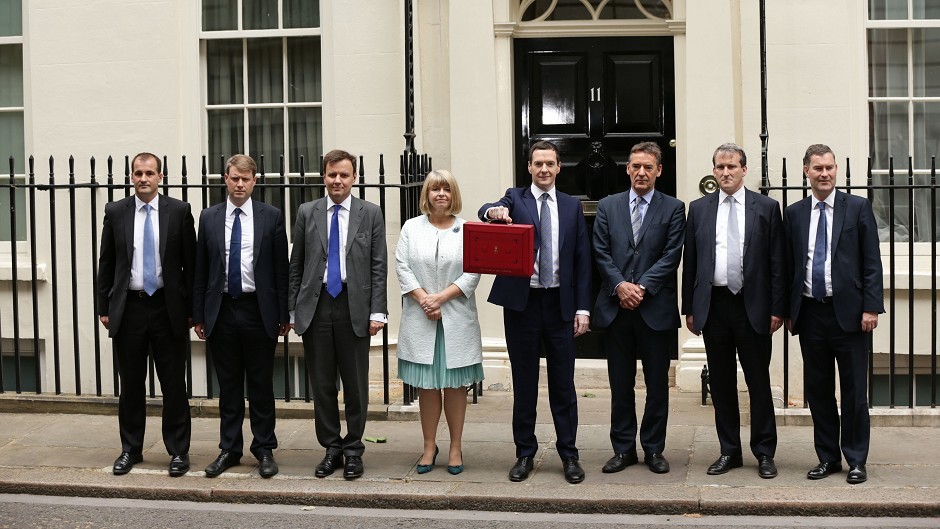 Chancellor George Osborne with his Treasury team outside 11 Downing Street