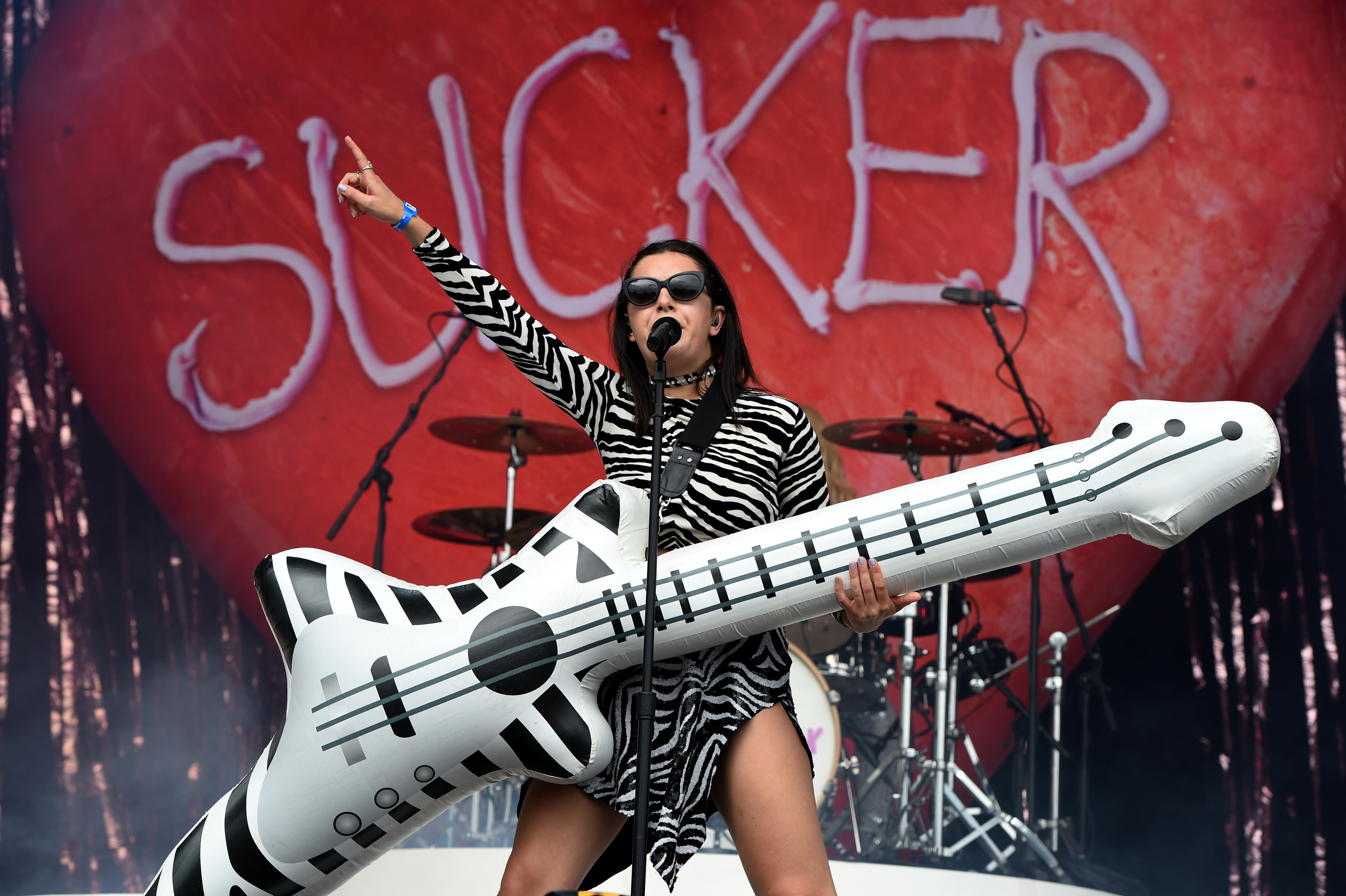 Charli XCX with her oversized guitar. Picture by Kenny Elrick 