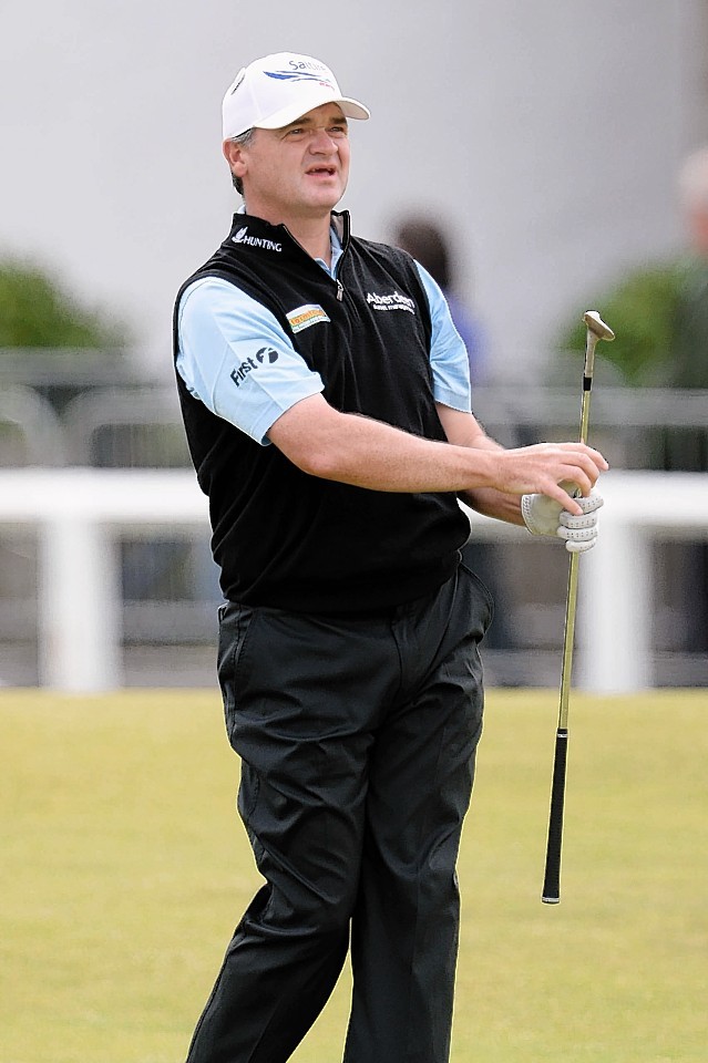 Paul Lawrie watches on following a shot on his final round 