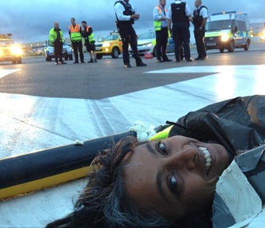 'Plane Stupid' selfie - protesters take pictures on the runway