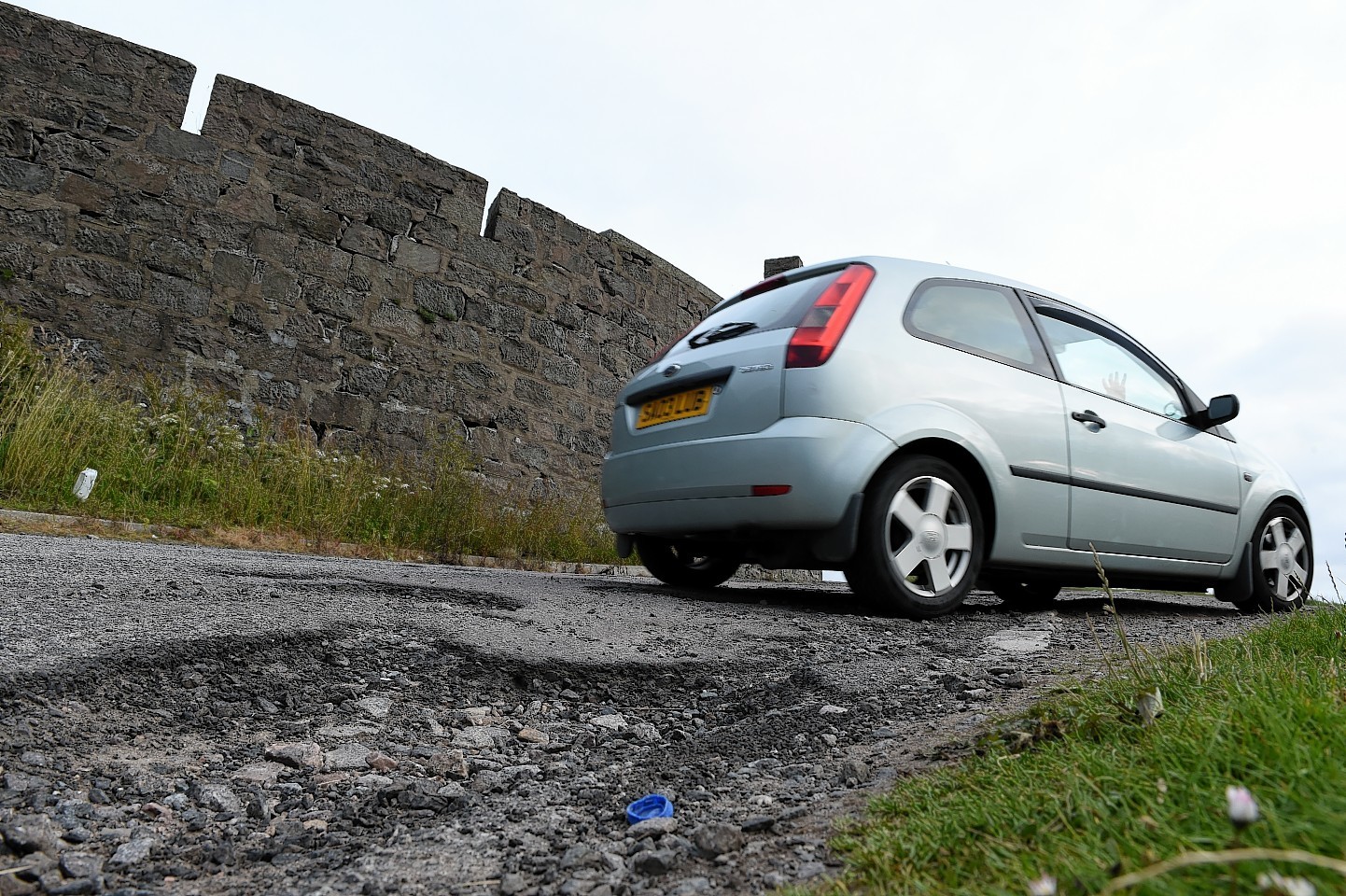 Potholes at Nigg car park. Picture by Kevin Emslie