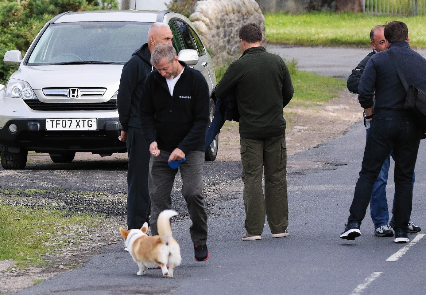 Abramovich and his corgi go for a walk around Arran 