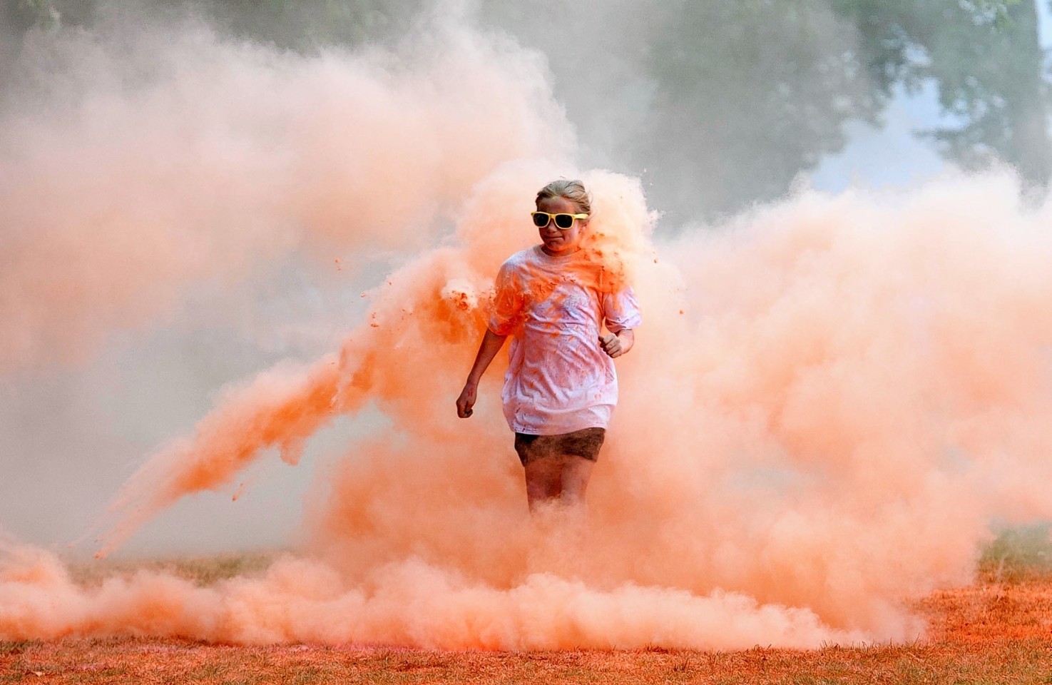 Runners take part in a charity event, Run For Colour in Inverness. 