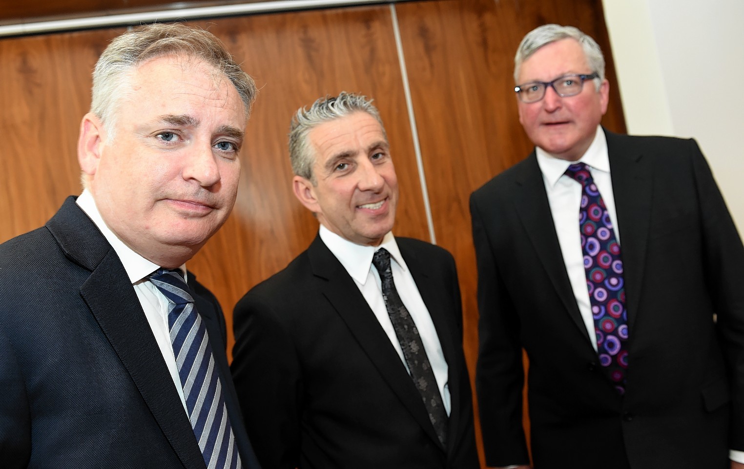 Young's boss Pete Ward (centre) with Richard Lochhead MSP and Fergus Ewing MSP.