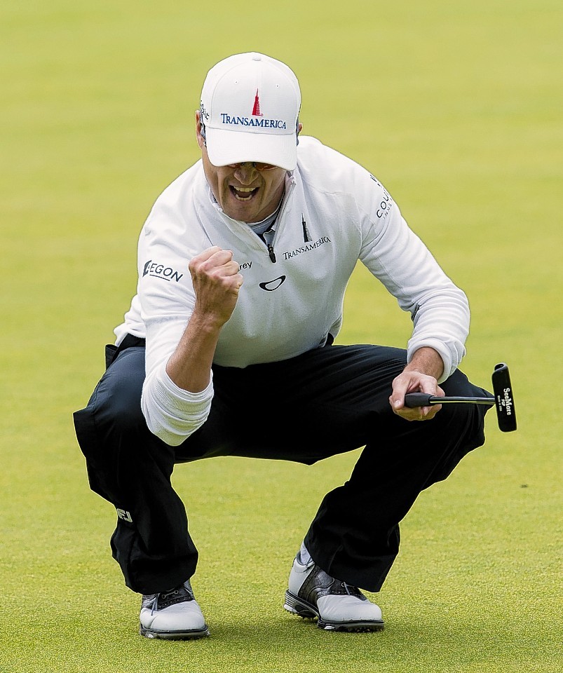 Johnson celebrates on the 18th green