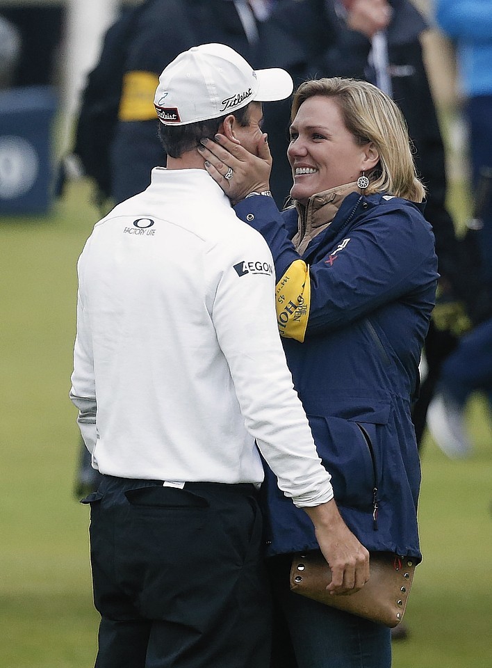 Johnson celebrates his victory with his wife Kim. Picture by Danny Lawson/PA Wire