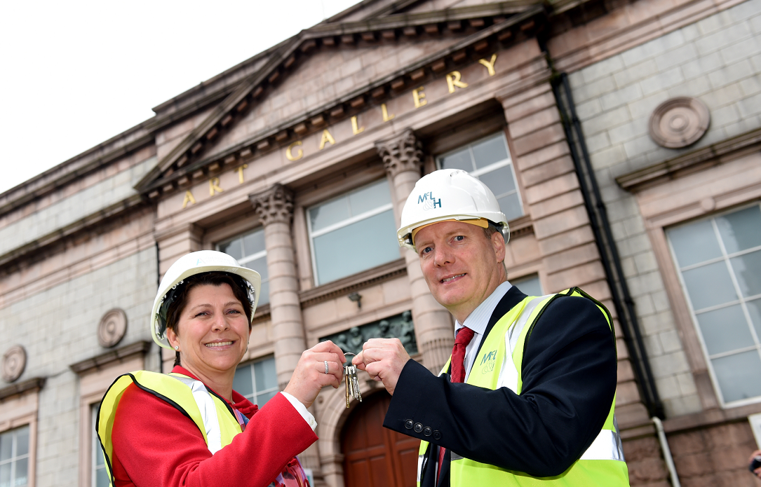Deputy Aberdeen City Council Leader Marie Boulton hands over the keys to the Art Gallery to contractors McLaughlin and Harvey Director Michael Kieran for the redevelopment of the gallery.