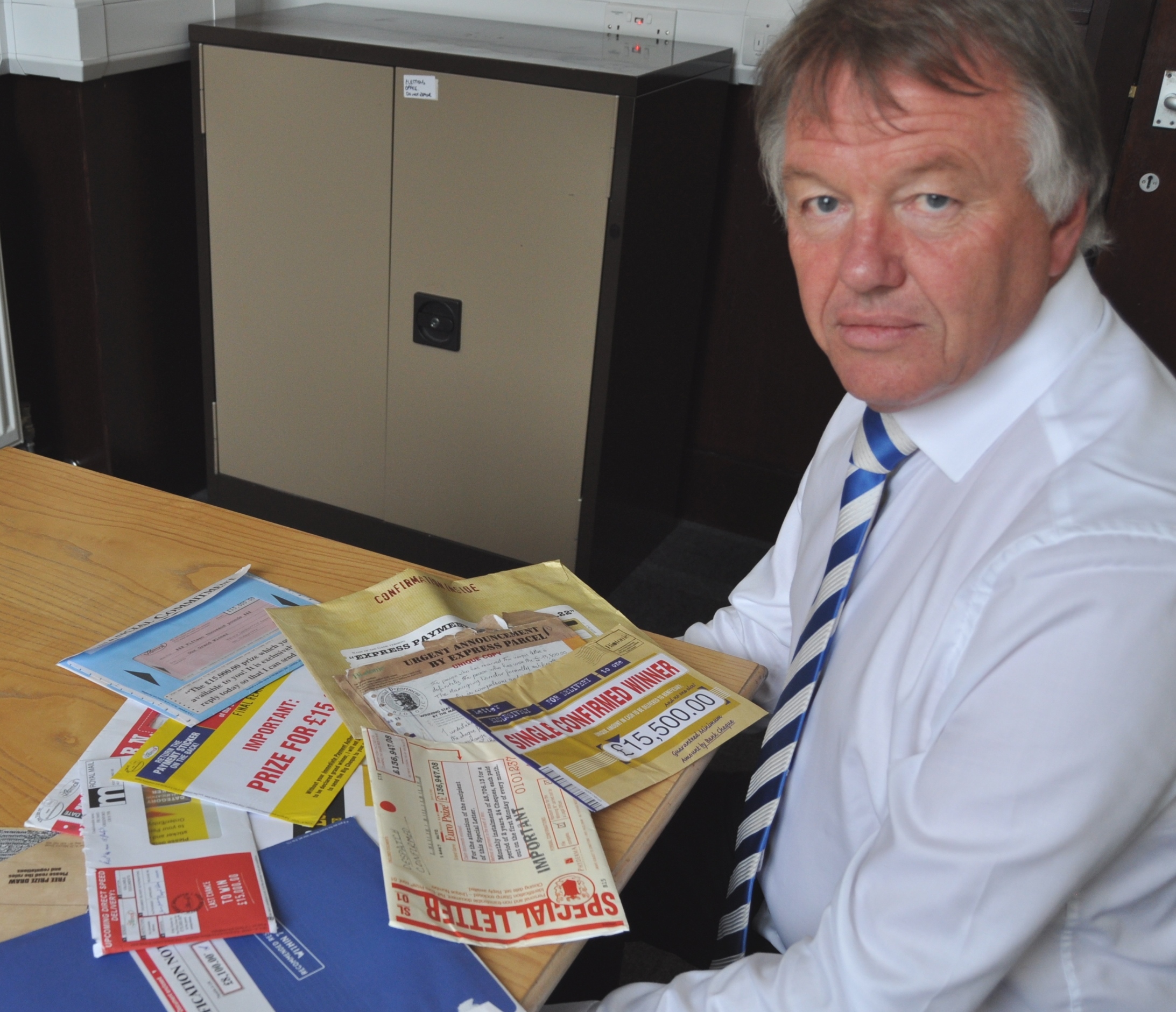 Moray Council's Stuart Duncan with scam mail