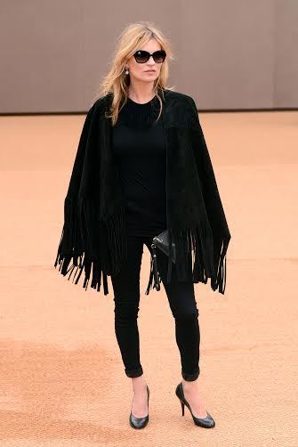 Kate Moss arriving for the Burberry Prorsum womenswear catwalk show at Kensington Gardens, as part of London Fashion Week. 