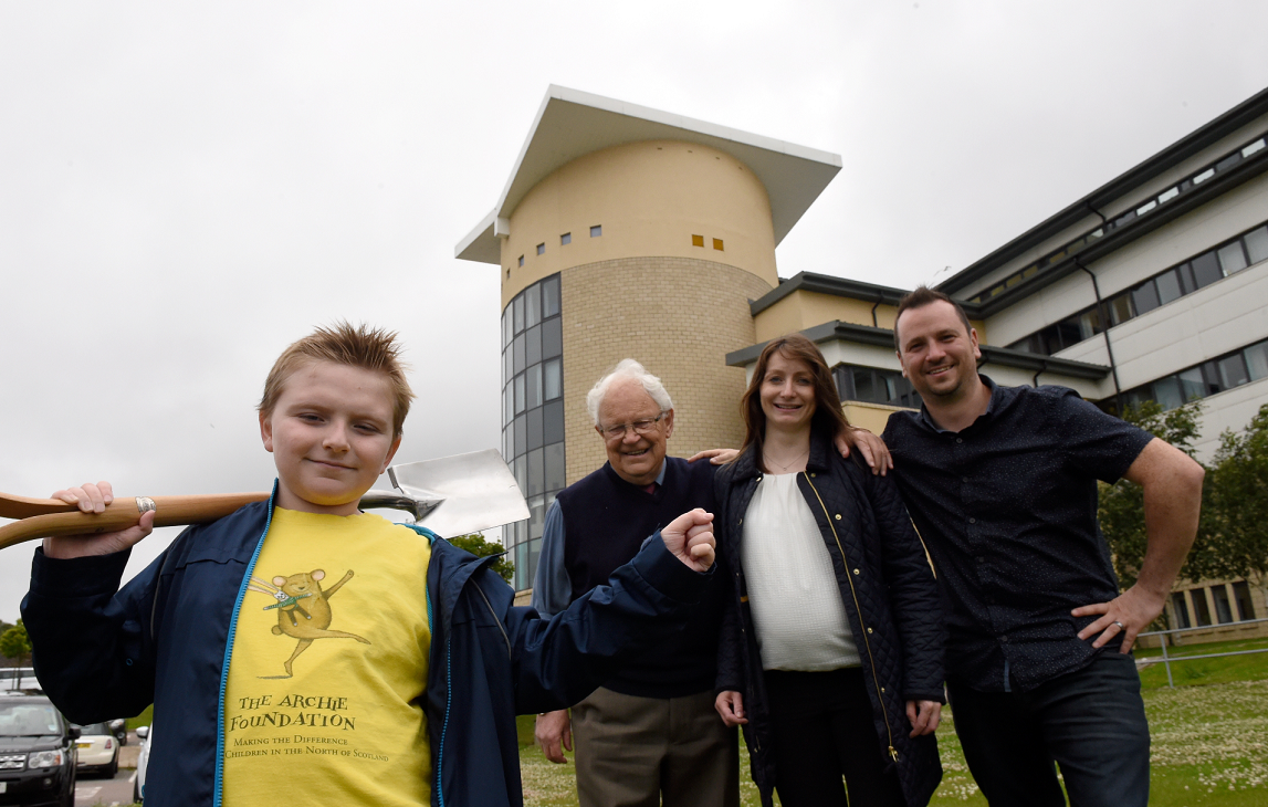 Patient Calum Stewart, P&J columnist and Beechgrove gardener Jim McColl, Laura Wood (Wood Group) and Dave Tipping (Director of Projects) outside the children's hospital