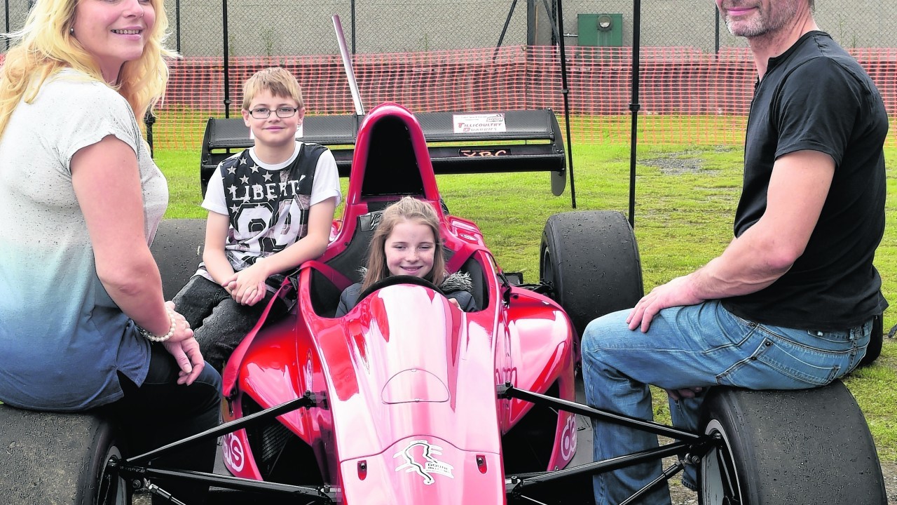 Graeme Wight with his GWR Raptor. Children, twins Ellie and Charlie, 13 and Mhairi Hosking.