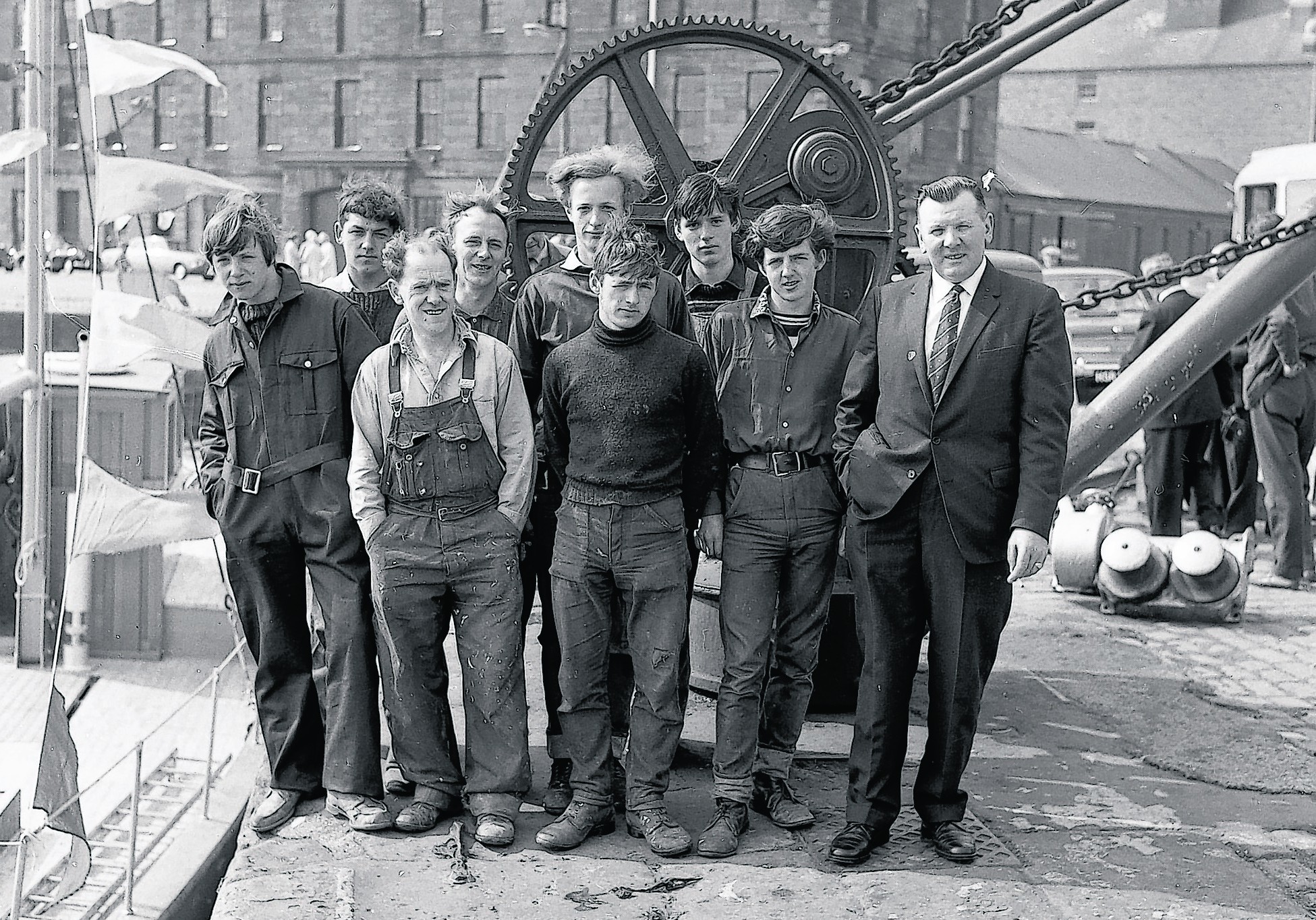 A 1967 image of men from local boatbuilders Arbuthnott & Son at Montrose Harbour.  Photo: Angus Archives