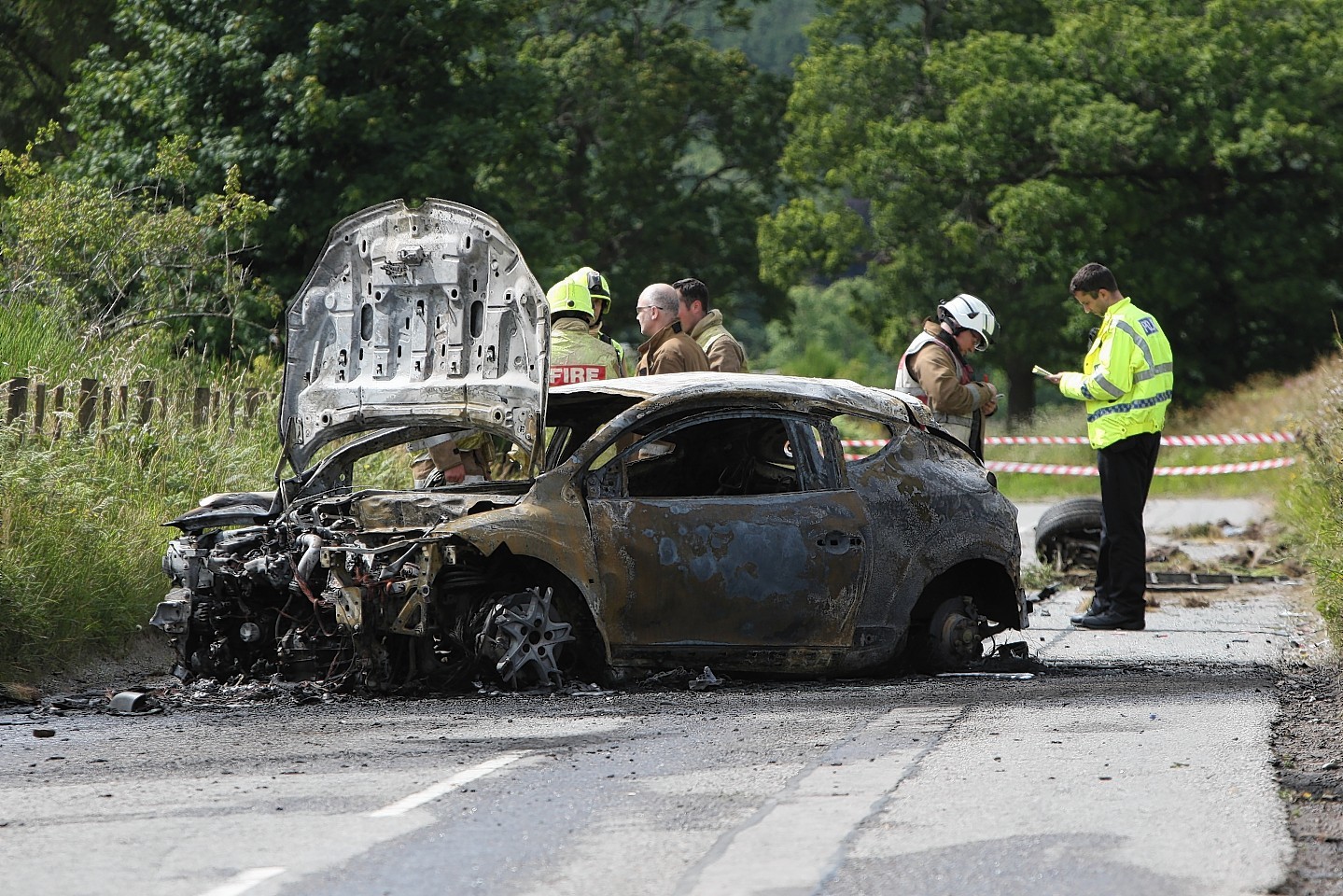 The remains of the burnt out car on the A831 near Kilmorack Gallery