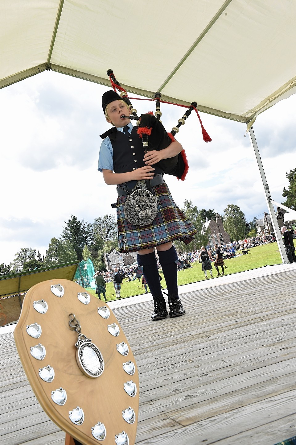 Aboyne Highland Games - Piper Liam Brown, 11, from Johnshaven won the under 14 March. Picture by COLIN RENNIE