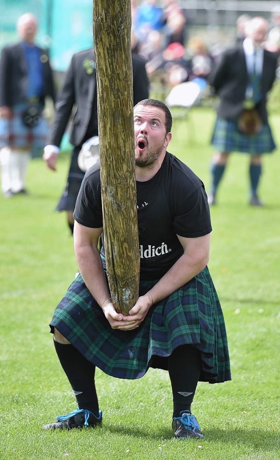 Aboyne Highland Games - Throwing the caber - Dale Walker. Picture by COLIN RENNIE