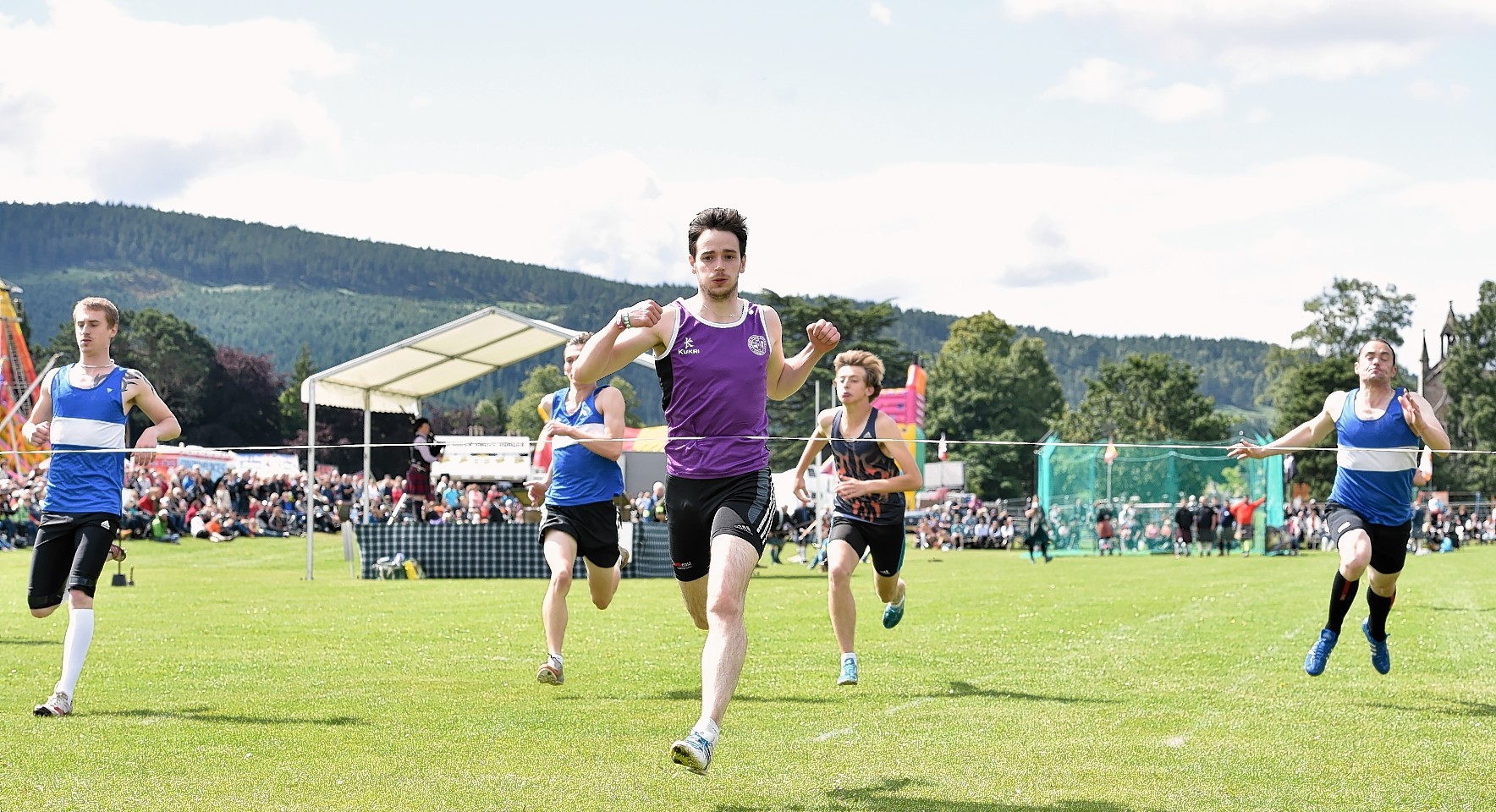 Aboyne Highland Games - winner of the 100 yard race - Sam Lyon from Aberdeen. Picture by COLIN RENNIE