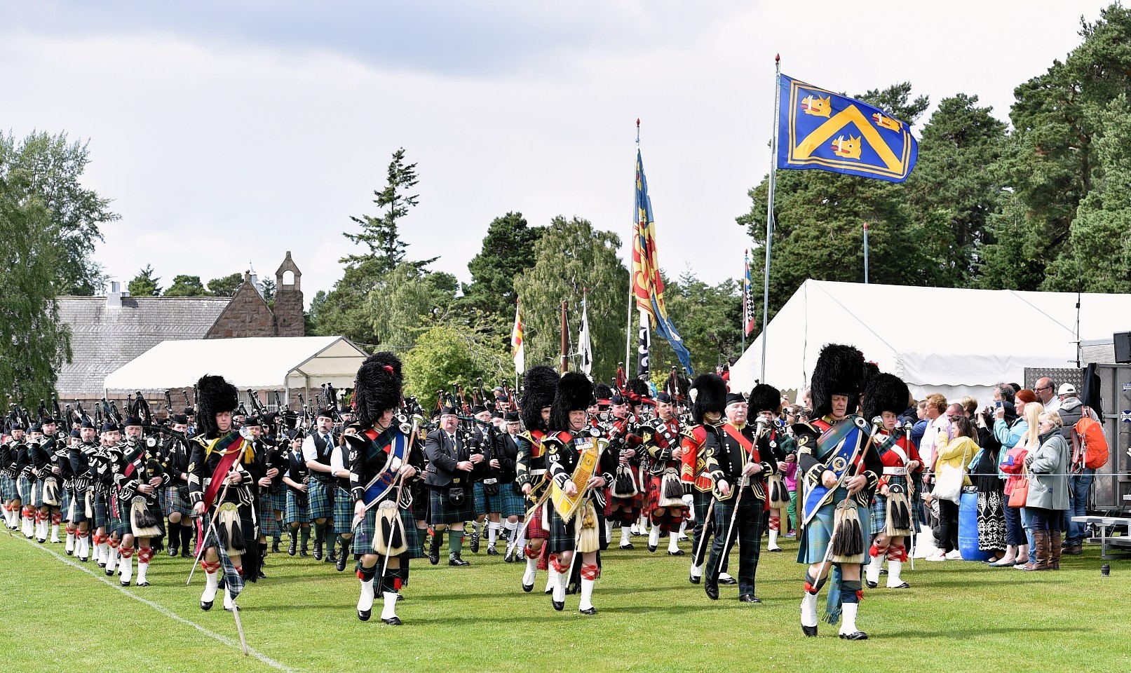Aboyne Highland Games - The mass pipe bands. Picture by COLIN RENNIE