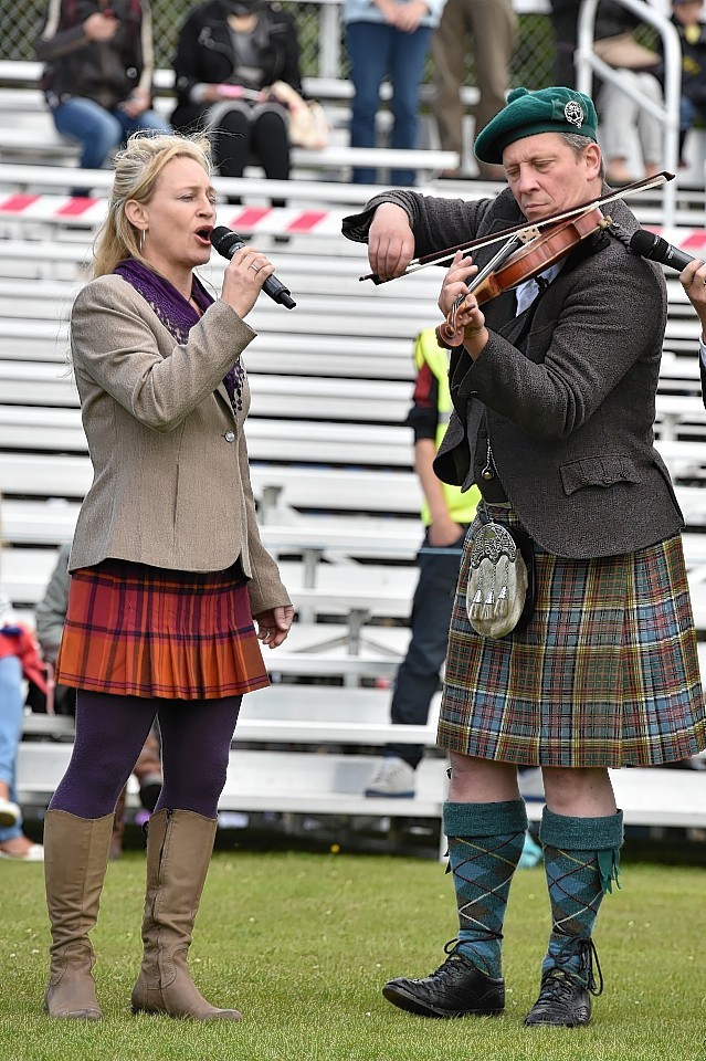 Aboyne Highland Games - Paddy Arthur and Paul Anderson at the opening ceremony. Picture by COLIN RENNIE