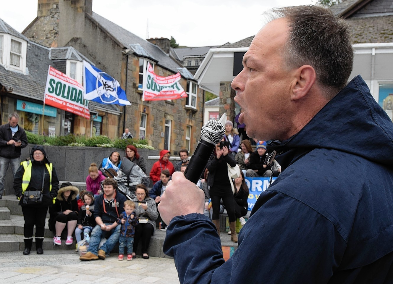 Tony Cox of the Unemployed Workers Network addresses crowds at the Fort William Anti-austerity rally