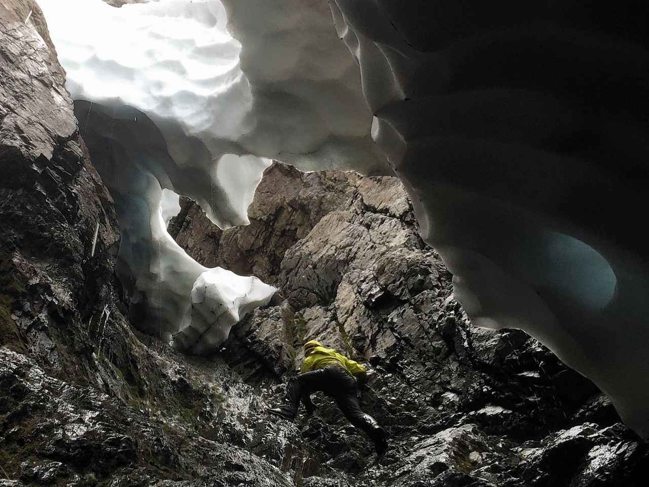 The pictures show summer snow caves clinging to the slopes of Ben Nevis 