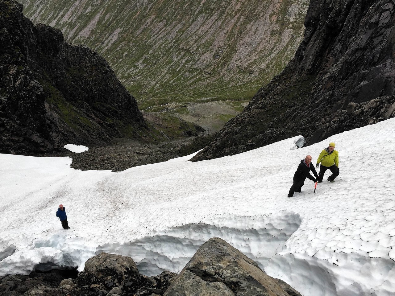 The pictures show summer snow caves clinging to the slopes of Ben Nevis 