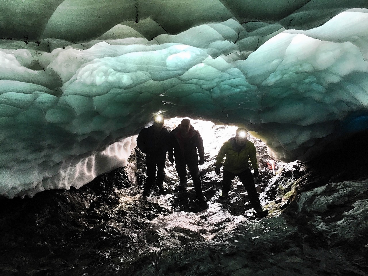 The pictures show summer snow caves clinging to the slopes of Ben Nevis 
