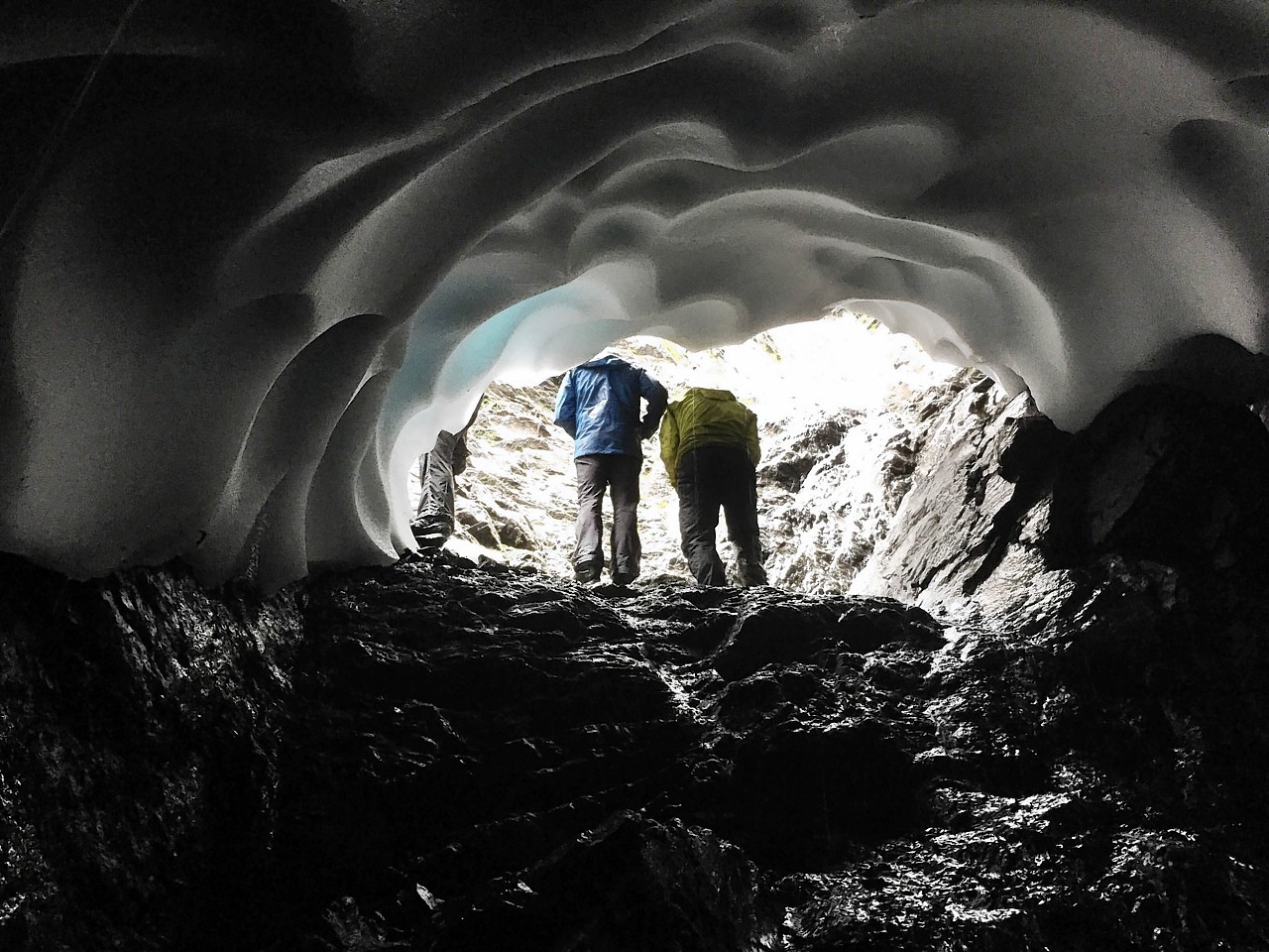 The pictures show summer snow caves clinging to the slopes of Ben Nevis 