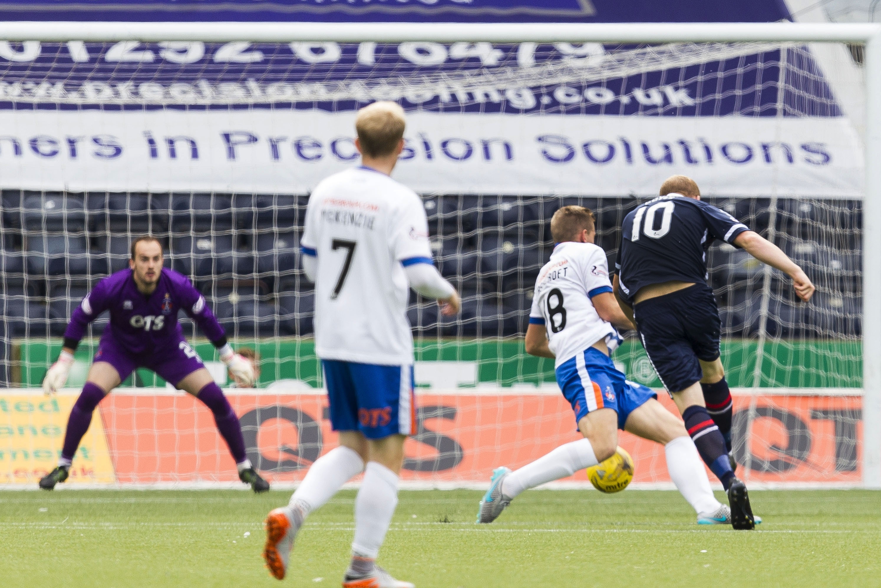 Ross County's Liam Boyce (right) fires home the first goal for his side