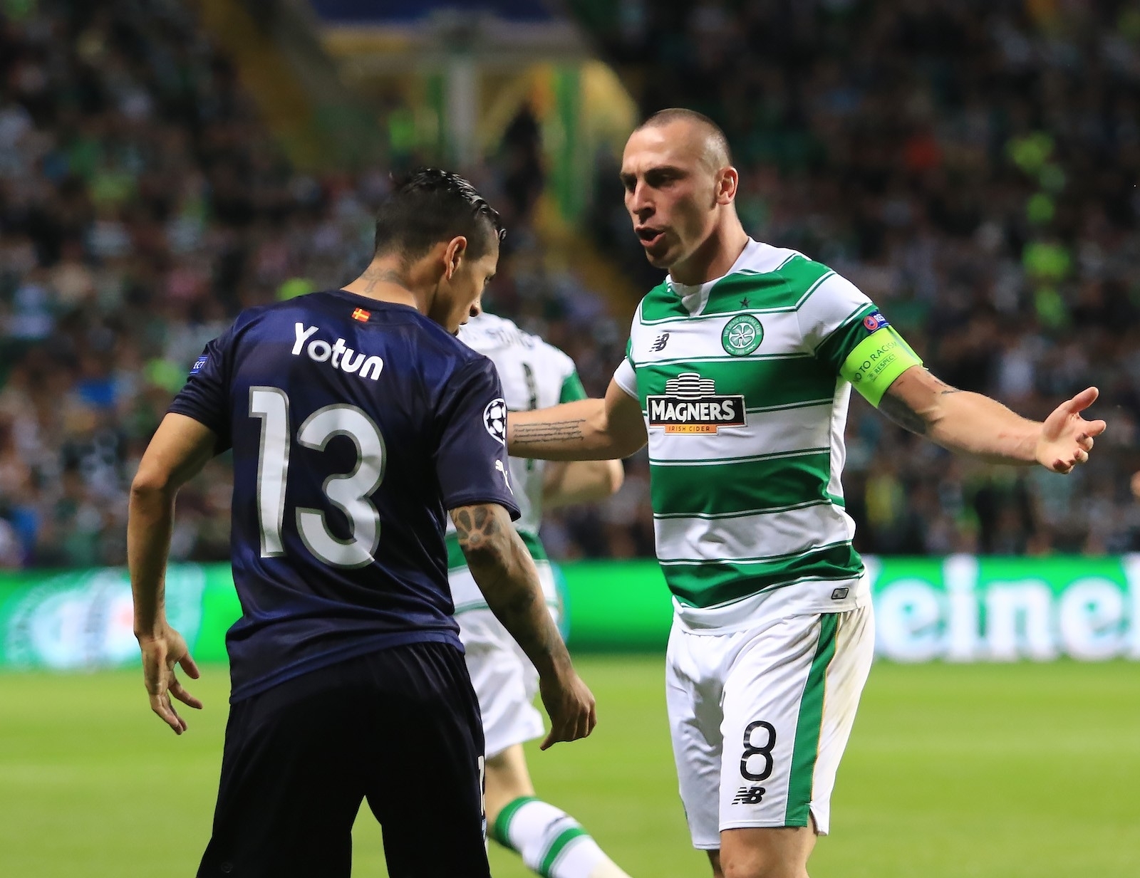 Celtics Scott Brown has an argument with Malmö FF Victor Yotun 