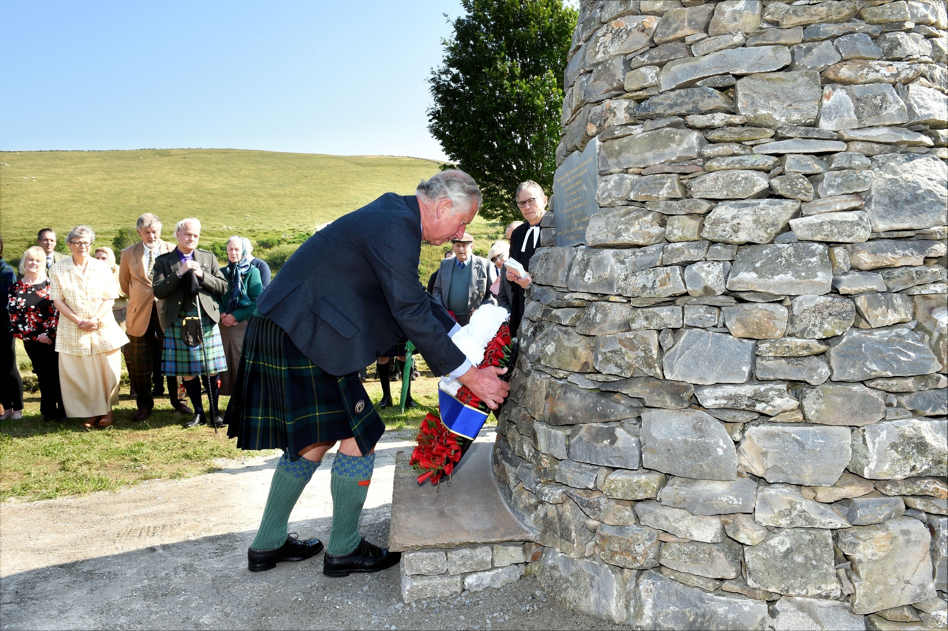 Laying the wreath during a visit to Cabrach Cairn