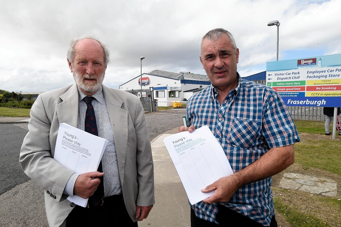 Councillors Charles Buchan and Brian Topping wih the open letter