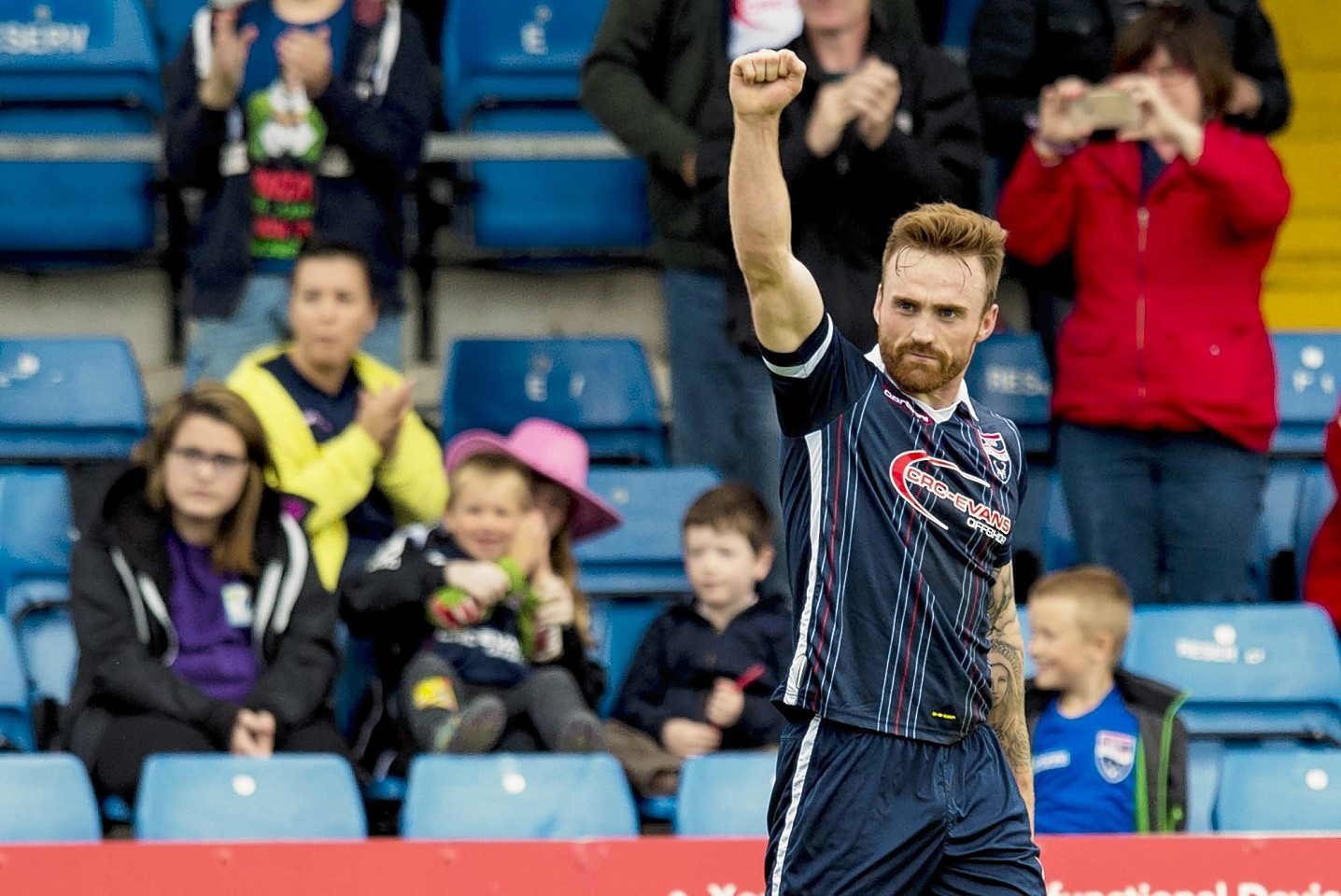 Curran salutes the Staggies fans after netting his second goal 