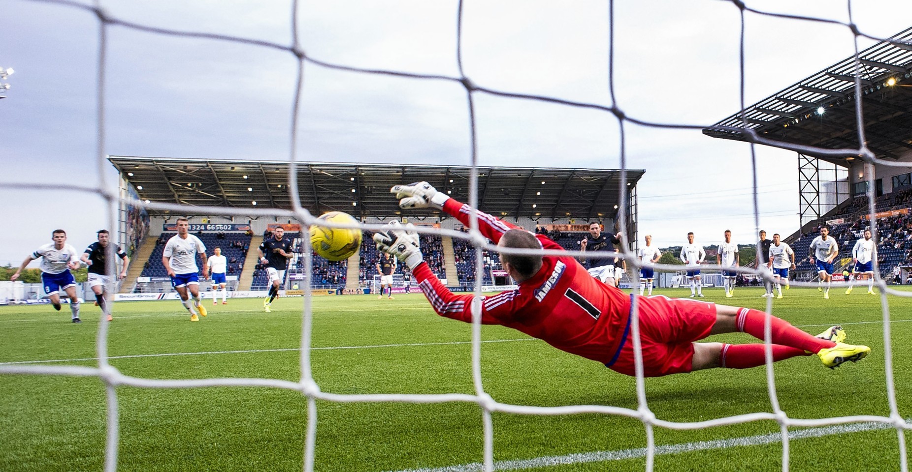 Peterhead goalkeeper Graeme Smith  in action