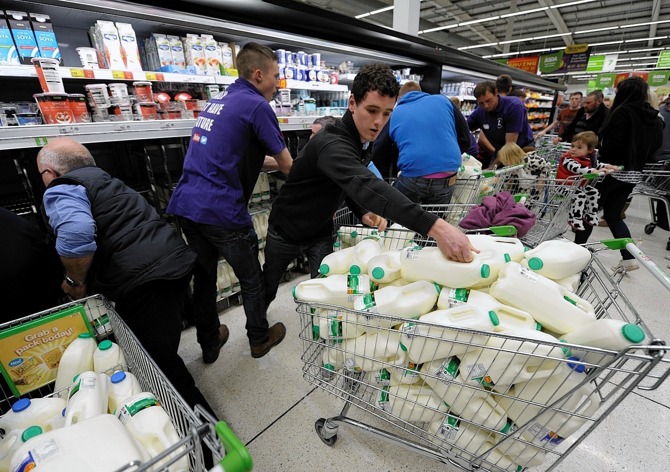 Farmers have been raiding supermarkets of milk in protest over poor prices