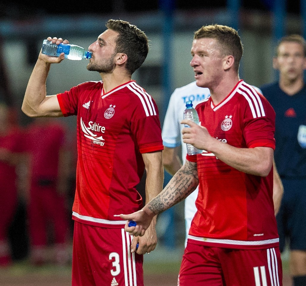 Hayes (right) has been impressed with the way Shinnie (left) has taken to life at Aberdeen