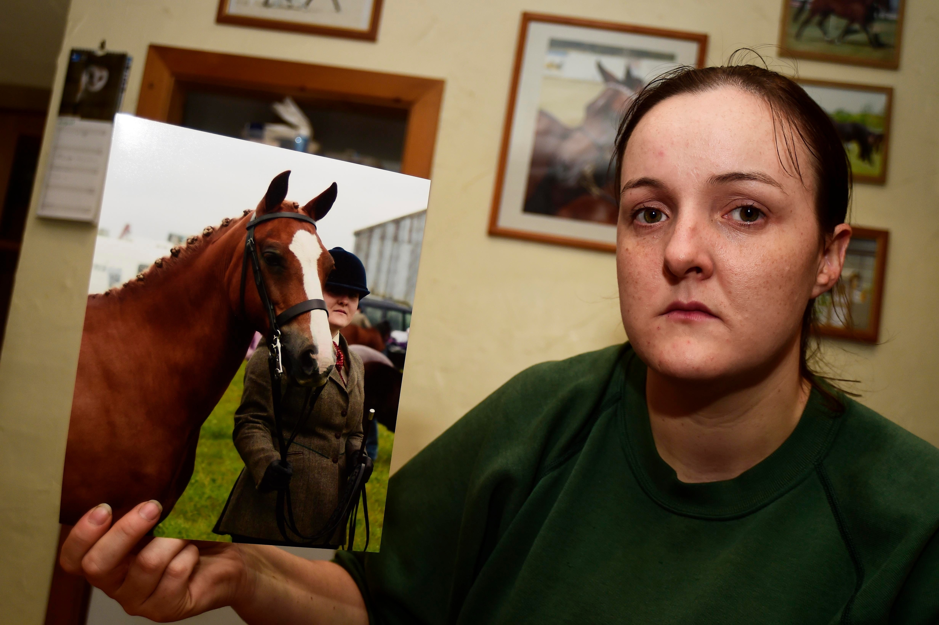 Zoe, devastated after the violent death of her horse