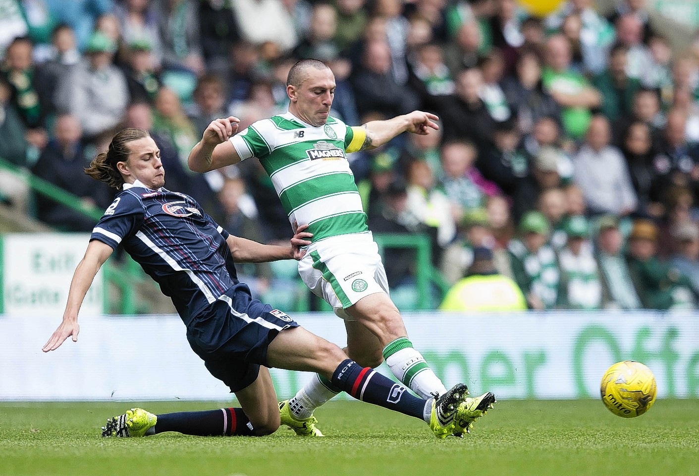 Irvine battles with Celtics Scott Brown in the middle of the park 