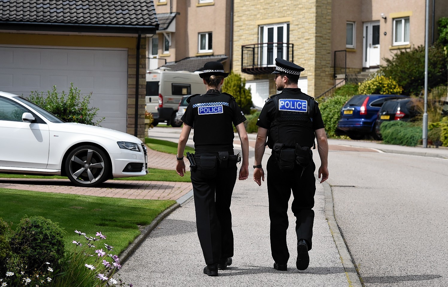 PC Jennifer Greer and PC Alexander Bowser-Riley out on patrol.