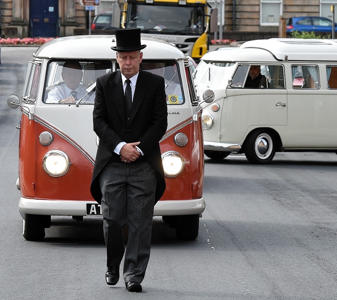 John Swingler leads Tom Bruce's funeral procession  in his best friends beloved campervan.    
Picture by Kami Thomson