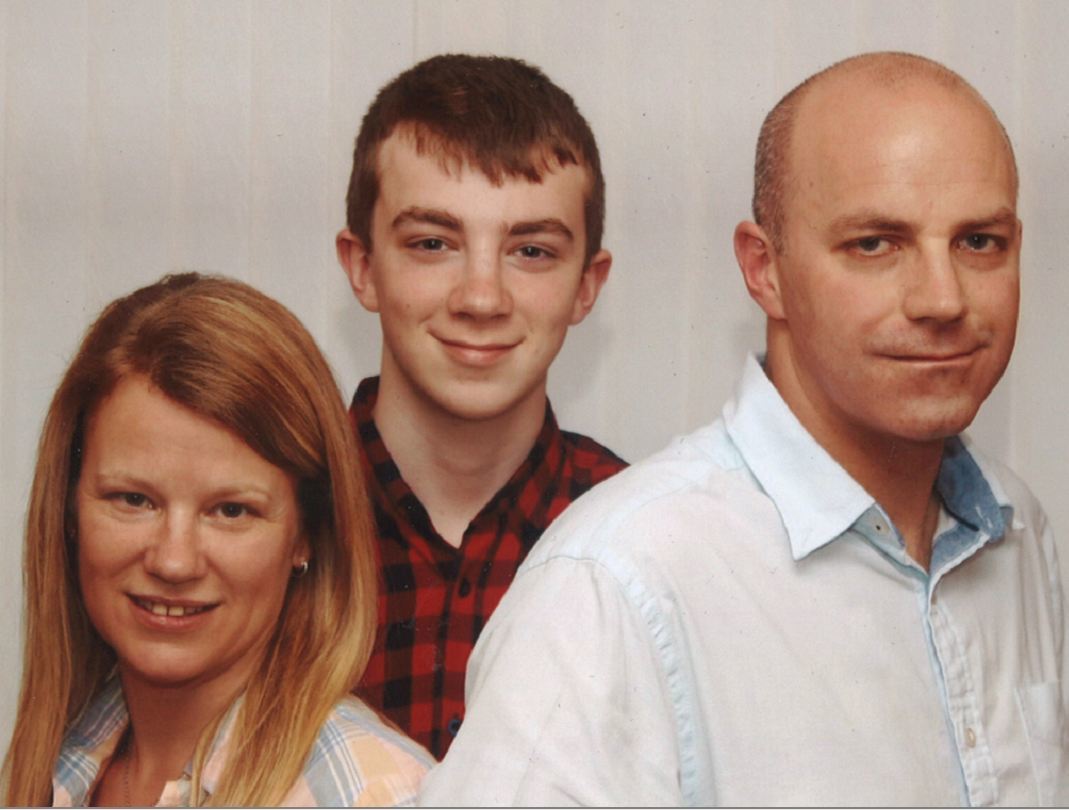 Michael McLean with his mother and father