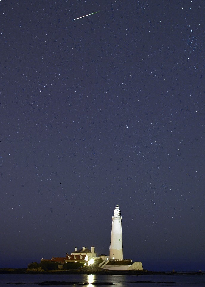 A meteor seen during a Perseids meteor shower over St Mary's Lighthouse near Whitley Bay