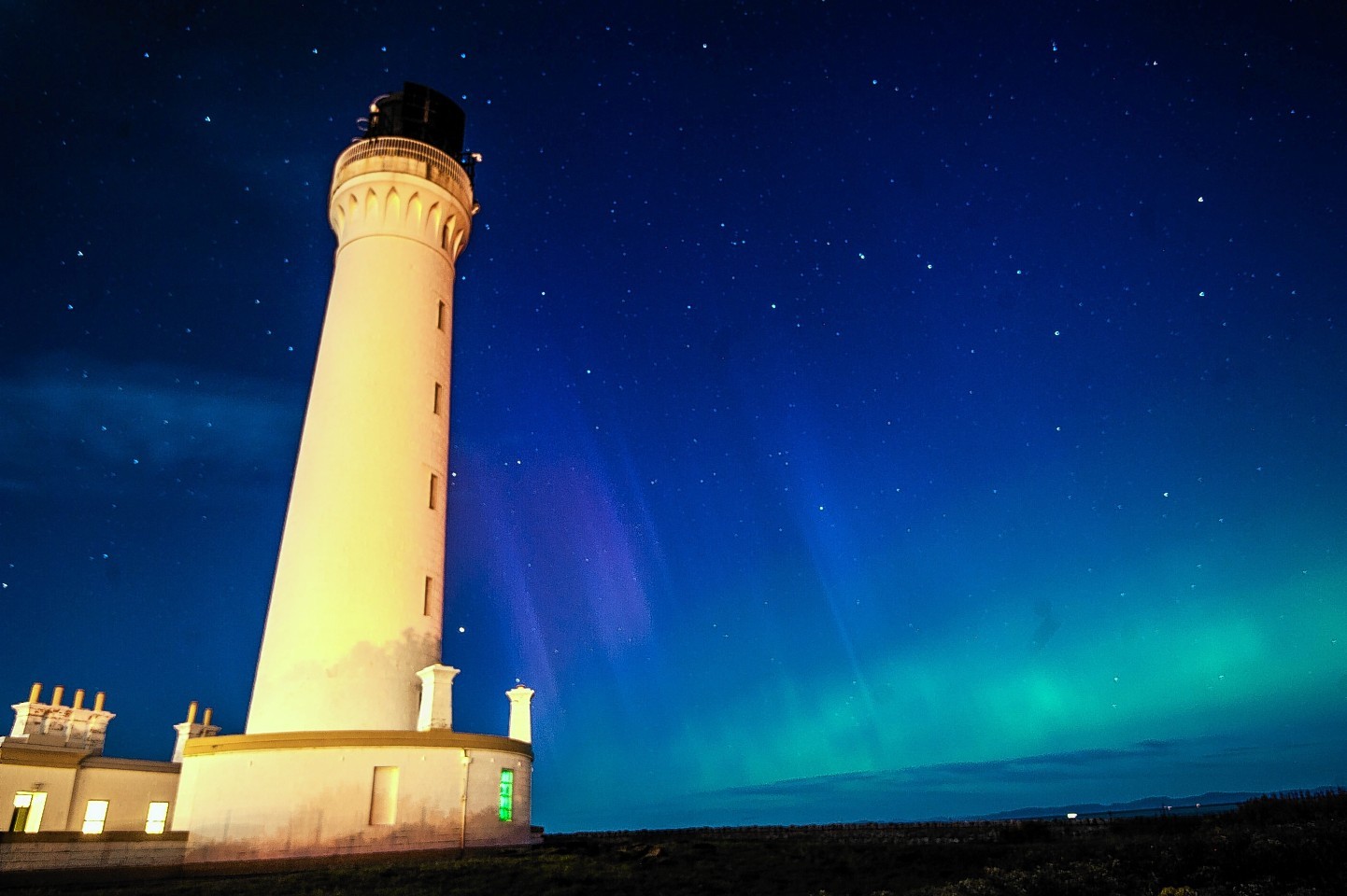 The Northern Lights, Aurora Boreali over Lossiemouth lighthouse
