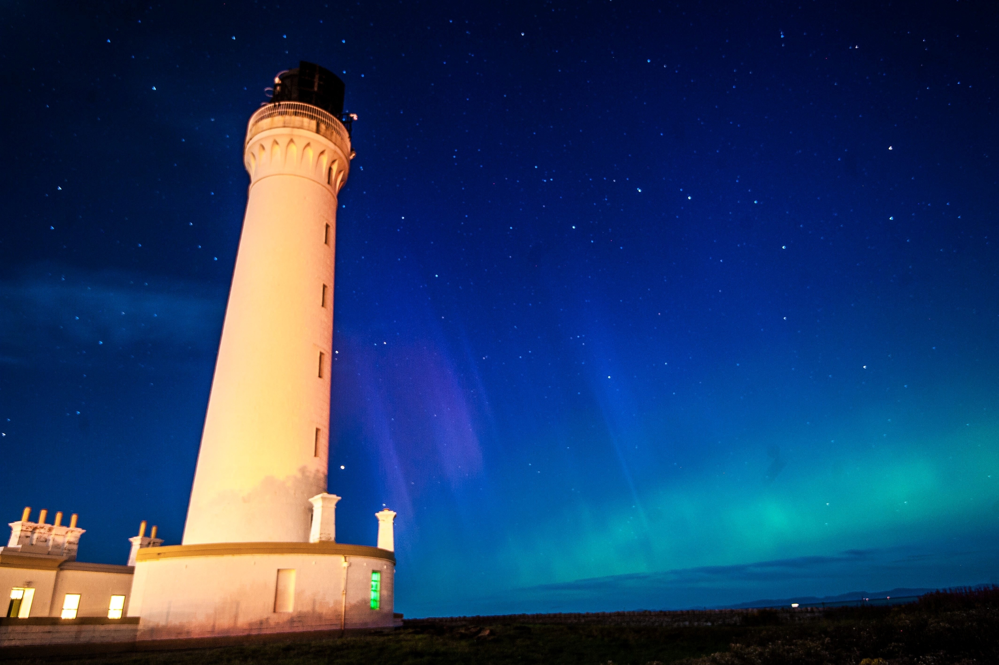 The Northern Lights, Aurora Borealis, are seen over the lighthouse in Lossiemouth