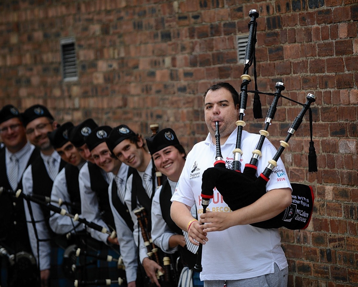 Piper Rikki Evans with the Catamount Pipe Band