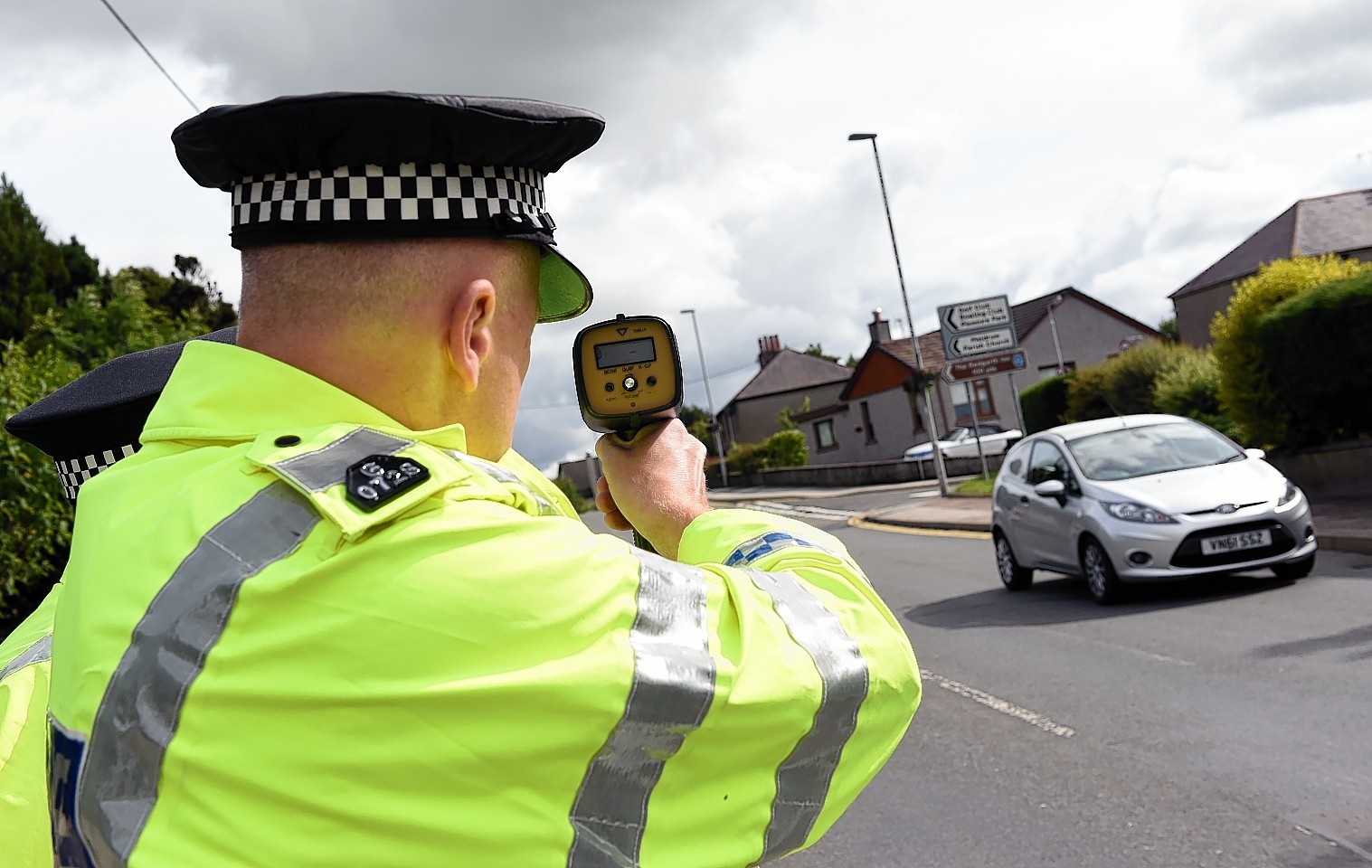 PC Jim Wilkinson out doing speed checks on the A947 through Oldmeldrum.